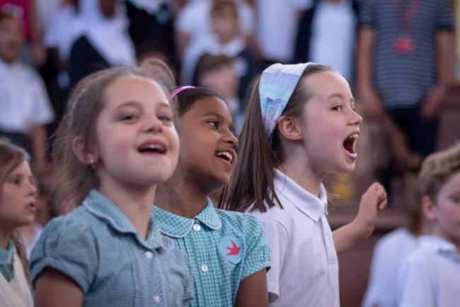 Children singing at the multilingual concert